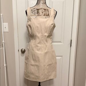 Cream faux leather dress.  Size LARGE NEW